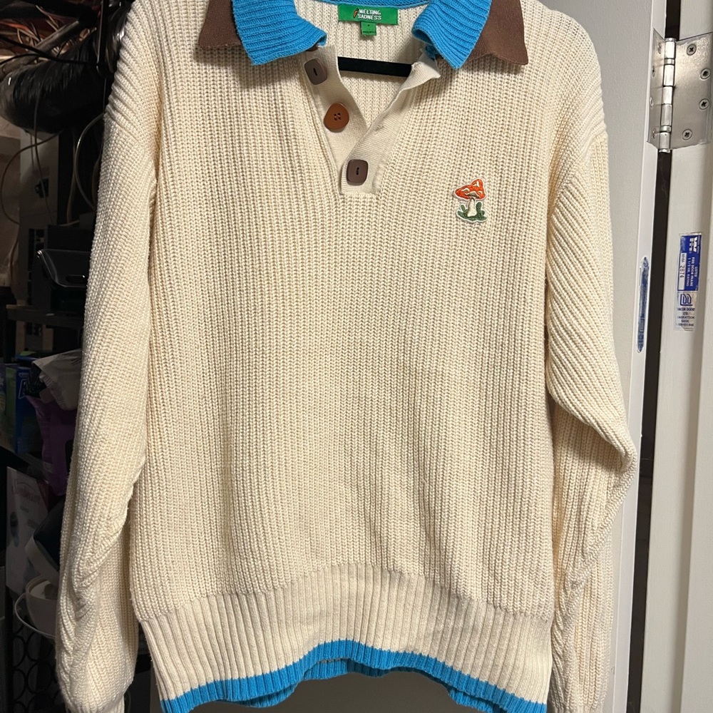 Melting Sadness Cream Sweater with Blue and Brown Details